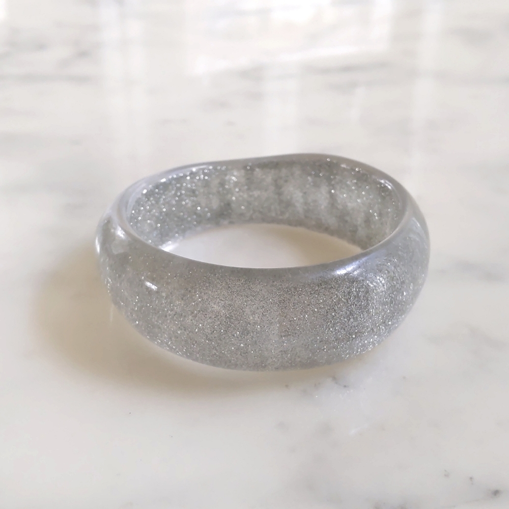 NWT. The Limited 0.75"-1" Uneven Width/Thickness Sparkle Silver Bangle Bracelet.